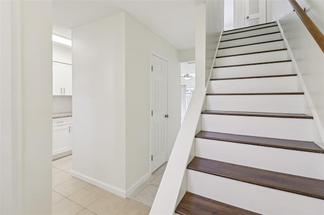 2200 S Palmetto Ave Unit B050, South Daytona, FL 32119 - staircase featuring tile patterned flooring and baseboards