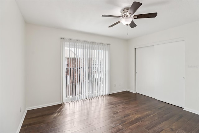 2200 S Palmetto Ave Unit B050, South Daytona, FL 32119 - unfurnished bedroom with hardwood / wood-style floors, a closet, and ceiling fan
