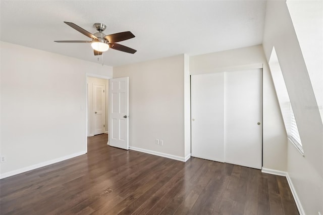 2200 S Palmetto Ave Unit B050, South Daytona, FL 32119 - unfurnished bedroom featuring dark wood-style floors, a closet, and a ceiling fan