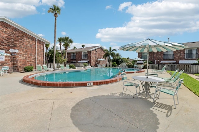 2200 S Palmetto Ave Unit B050, South Daytona, FL 32119 - community pool featuring a patio area