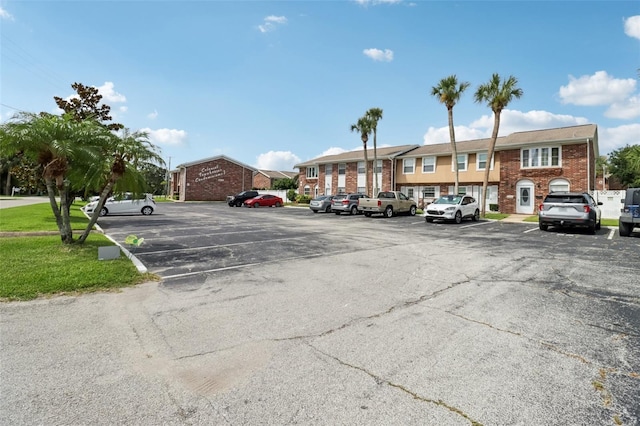2200 S Palmetto Ave Unit B050, South Daytona, FL 32119 - uncovered parking lot with a residential view