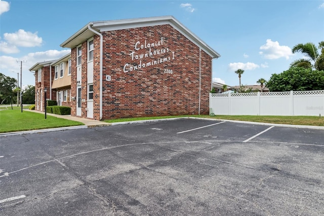 2200 S Palmetto Ave Unit B050, South Daytona, FL 32119 - view of building exterior featuring uncovered parking
