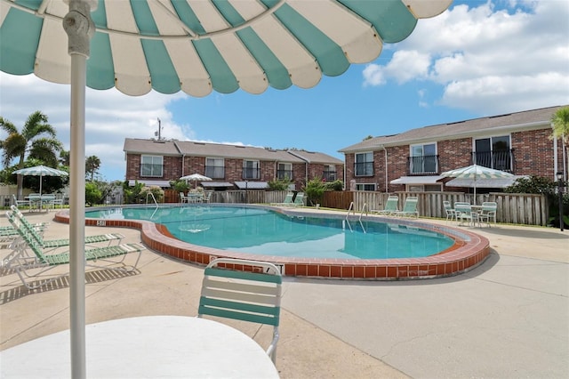 2200 S Palmetto Ave Unit B050, South Daytona, FL 32119 - community pool with a patio area and a residential view
