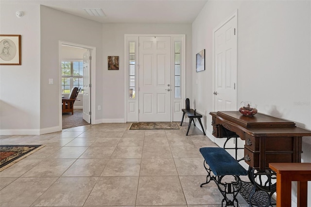 416 Riders Loop, Auburndale, FL 33823 - foyer featuring light tile patterned flooring and baseboards