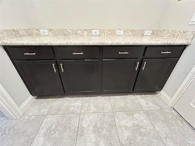 416 Riders Loop, Auburndale, FL 33823 - bathroom with baseboards and tile patterned flooring