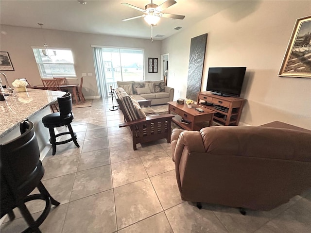 416 Riders Loop, Auburndale, FL 33823 - living room featuring a ceiling fan and light tile patterned floors