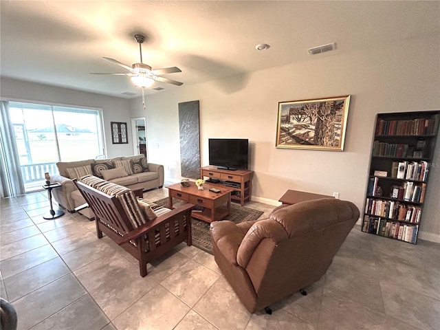 416 Riders Loop, Auburndale, FL 33823 - living room with a ceiling fan and light tile patterned floors