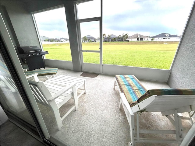 416 Riders Loop, Auburndale, FL 33823 - sunroom with plenty of natural light and a residential view