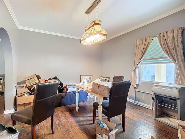 1505 E Elm Rd, Lakeland, FL 33801 - dining room featuring arched walkways, ornamental molding, and dark wood-style flooring