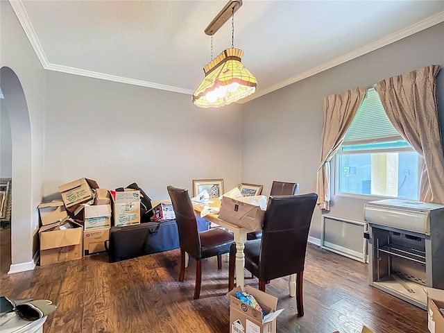 1505 E Elm Rd, Lakeland, FL 33801 - dining space with ornamental molding, arched walkways, and wood finished floors