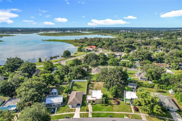 1505 E Elm Rd, Lakeland, FL 33801 - aerial view of residential area with a large body of water and a heavily wooded area