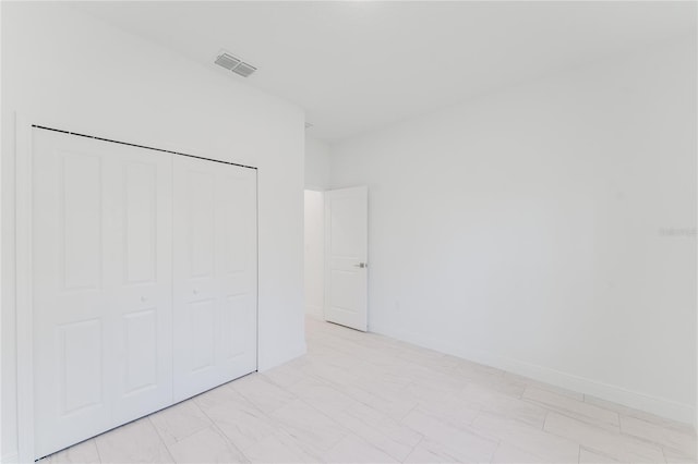 627 W Glenhaven Dr, Citrus Springs, FL 34434 - unfurnished bedroom with baseboards