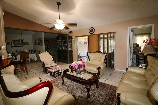 317 Cortez Ct, Kissimmee, FL 34758 - living area featuring tile patterned flooring, a ceiling fan, and vaulted ceiling