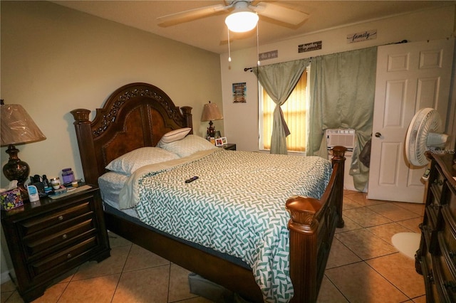317 Cortez Ct, Kissimmee, FL 34758 - tiled bedroom with an AC wall unit and a ceiling fan