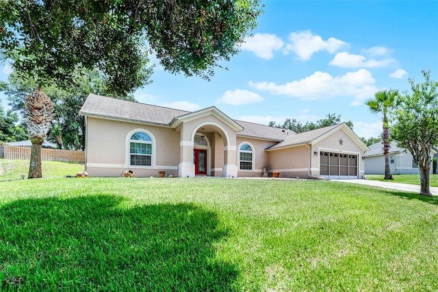 12617 Douglas Fir Ct, Clermont, FL 34711 - ranch-style home with an attached garage, stucco siding, and driveway