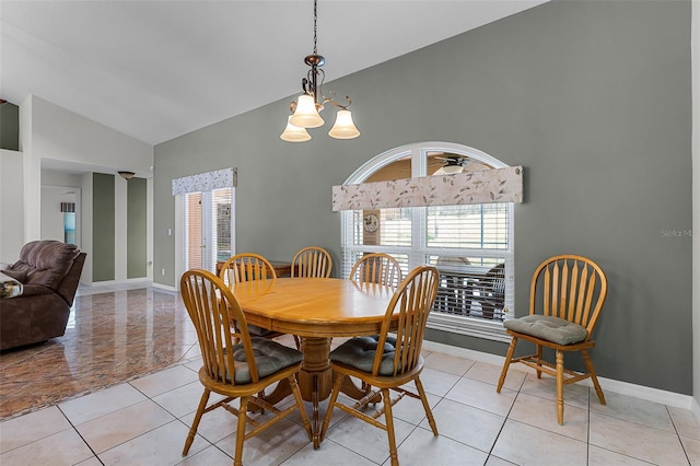 12617 Douglas Fir Ct, Clermont, FL 34711 - dining room featuring healthy amount of natural light, high vaulted ceiling, and light tile patterned flooring