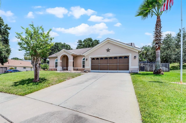 12617 Douglas Fir Ct, Clermont, FL 34711 - ranch-style house with stucco siding, a garage, and concrete driveway