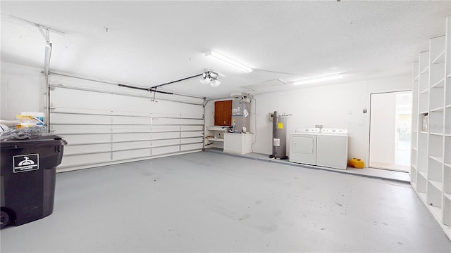 5045 Bermuda Cir Unit 12, Orlando, FL 32808 - garage with water heater, separate washer and dryer, a garage door opener, and heating unit