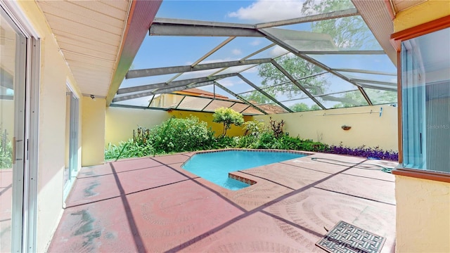5045 Bermuda Cir Unit 12, Orlando, FL 32808 - swimming pool with a patio area and a lanai