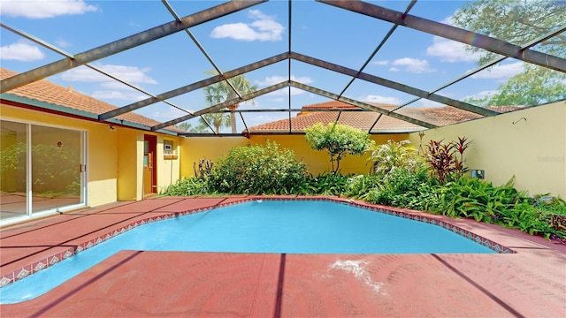 5045 Bermuda Cir Unit 12, Orlando, FL 32808 - outdoor pool with a lanai and a patio