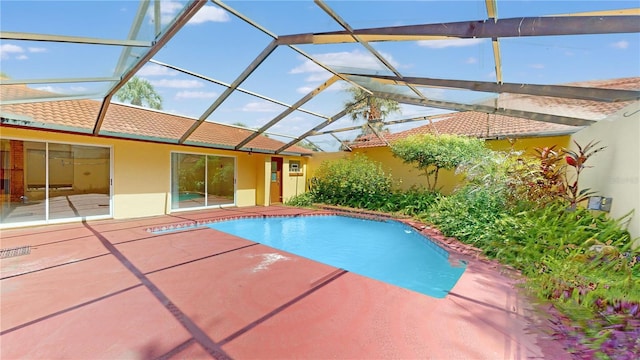 5045 Bermuda Cir Unit 12, Orlando, FL 32808 - outdoor pool with a patio and glass enclosure