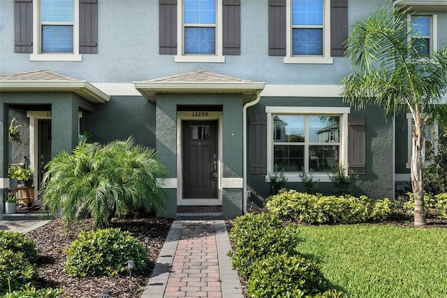 13298 Pontoon Rd, Winter Garden, FL 34787 - entrance to property with stucco siding
