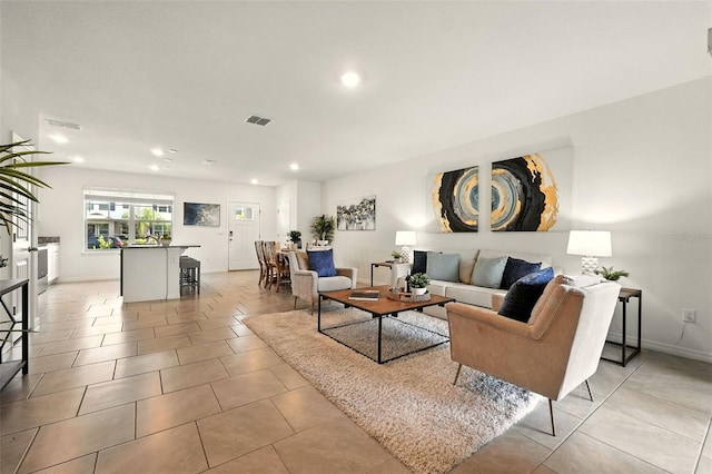 13298 Pontoon Rd, Winter Garden, FL 34787 - living room featuring recessed lighting and light tile patterned floors