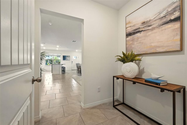 13298 Pontoon Rd, Winter Garden, FL 34787 - corridor featuring light tile patterned floors