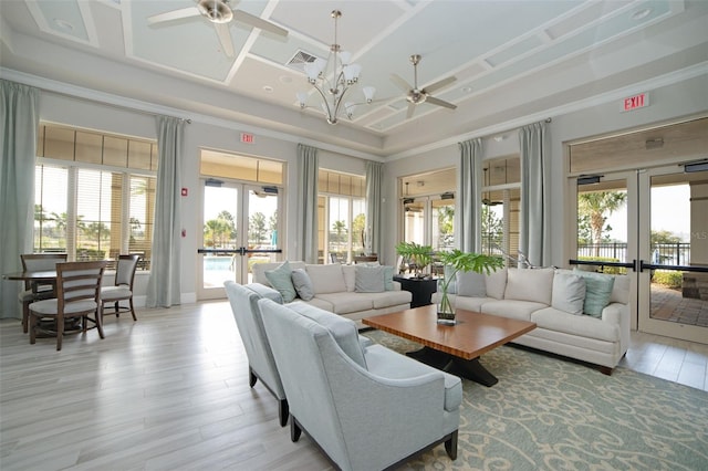 13298 Pontoon Rd, Winter Garden, FL 34787 - living room with french doors, ceiling fan, plenty of natural light, coffered ceiling, and light wood-style floors