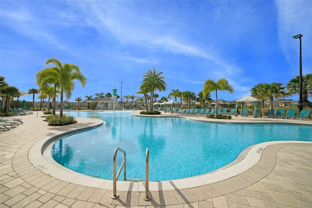 13298 Pontoon Rd, Winter Garden, FL 34787 - community pool featuring a patio