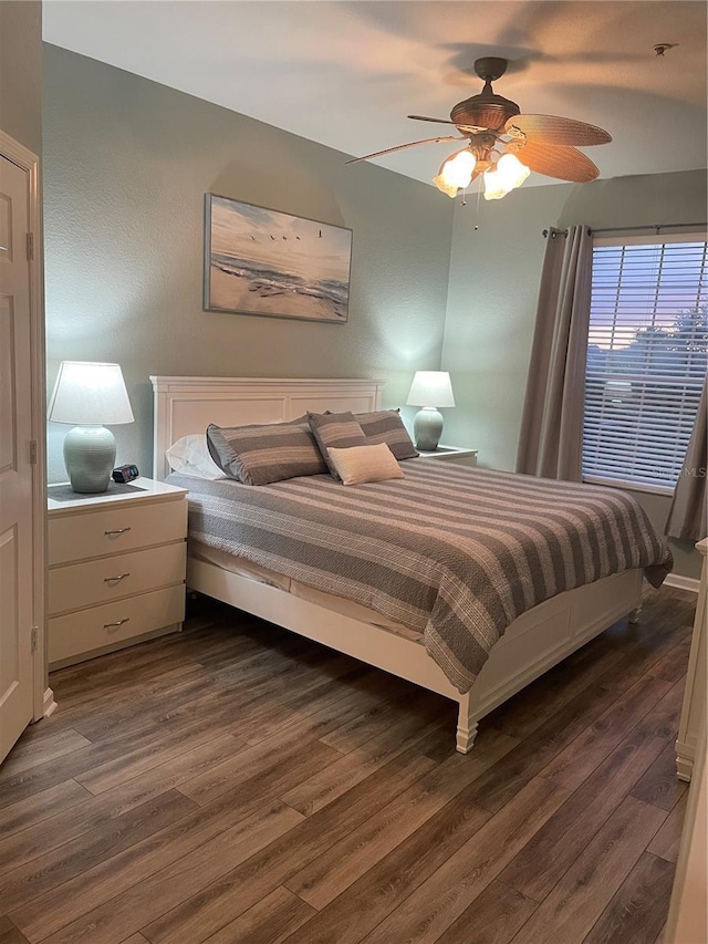 2817 Almaton Loop Unit 403, Kissimmee, FL 34747 - bedroom featuring dark wood-type flooring and ceiling fan