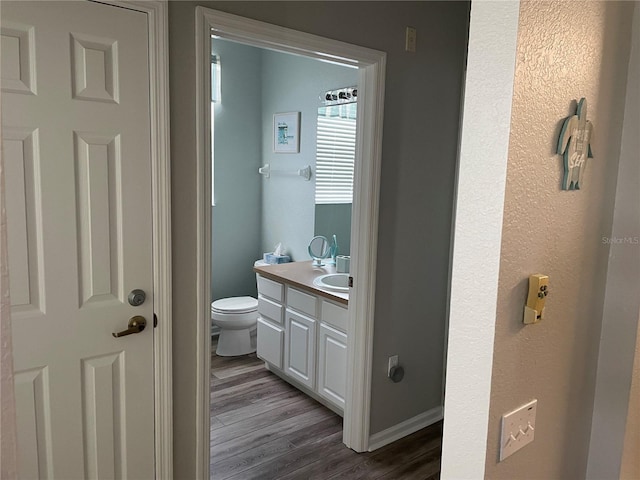 2817 Almaton Loop Unit 403, Kissimmee, FL 34747 - bathroom featuring vanity and wood finished floors