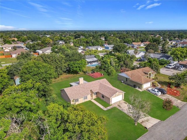 745 Mentmore Cir, Deltona, FL 32738 - aerial perspective of suburban area featuring a tree filled landscape
