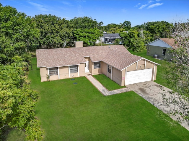 745 Mentmore Cir, Deltona, FL 32738 - view of front of property with concrete driveway, a garage, a chimney, a front yard, and a shingled roof