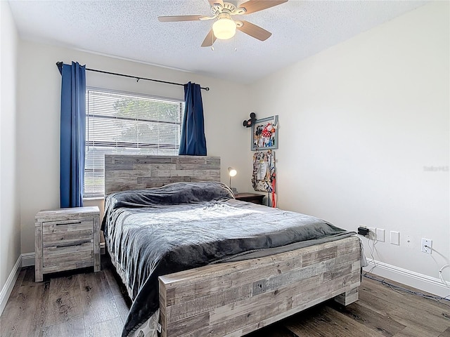 745 Mentmore Cir, Deltona, FL 32738 - bedroom with wood finished floors, a textured ceiling, and ceiling fan
