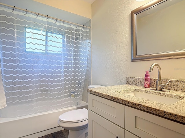 745 Mentmore Cir, Deltona, FL 32738 - bathroom featuring vanity, shower / bath combination with curtain, wood finished floors, and a textured wall