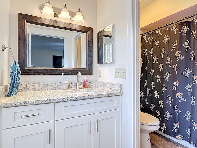 745 Mentmore Cir, Deltona, FL 32738 - bathroom featuring vanity, wood finished floors, and a shower with curtain