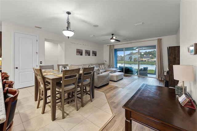 4920 Blanche Ct, Saint Cloud, FL 34772 - dining space featuring a ceiling fan and light tile patterned floors