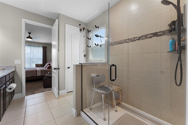 4920 Blanche Ct, Saint Cloud, FL 34772 - ensuite bathroom with a stall shower, vanity, and tile patterned floors