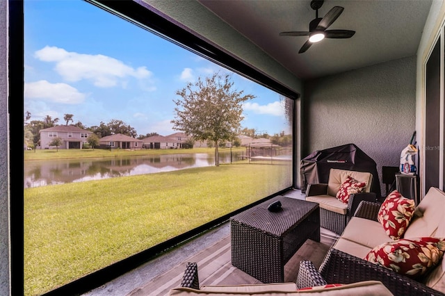 4920 Blanche Ct, Saint Cloud, FL 34772 - sunroom with a water view, a ceiling fan, and an outdoor hangout area