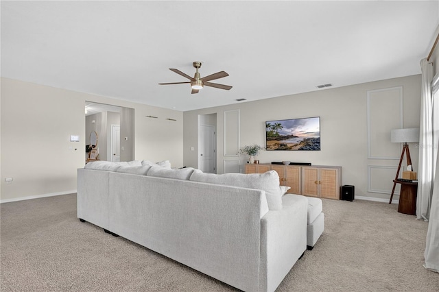 612 Auburn Grove Ter, Auburndale, FL 33823 - living area featuring light carpet and ceiling fan