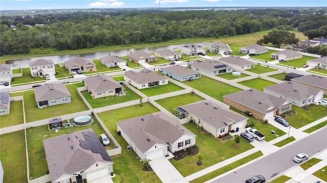 612 Auburn Grove Ter, Auburndale, FL 33823 - aerial view of residential area featuring a heavily wooded area and a nearby body of water