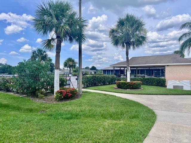 19 W Country Cove Way, Kissimmee, FL 34743 - view of home's community featuring a yard