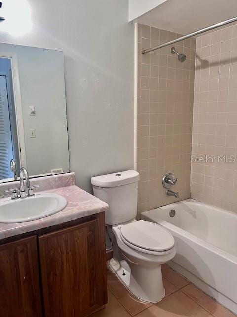 19 W Country Cove Way, Kissimmee, FL 34743 - full bathroom with vanity, tile patterned floors, and bathtub / shower combination