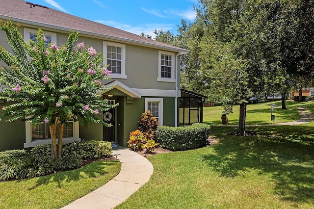741 Ashworth Overlook Dr Unit B, Apopka, FL 32712 - view of front of property featuring stucco siding and a front yard