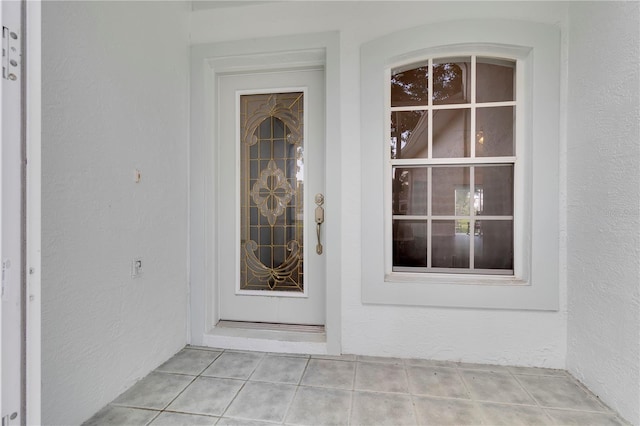3507 Tenby Cir, Clermont, FL 34711 - doorway to property with stucco siding
