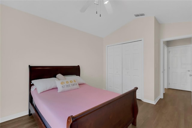 3507 Tenby Cir, Clermont, FL 34711 - bedroom with wood finished floors, a closet, lofted ceiling, and a ceiling fan