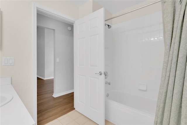 3507 Tenby Cir, Clermont, FL 34711 - full bathroom featuring shower / bath combo with shower curtain, vanity, and wood finished floors