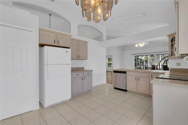 3507 Tenby Cir, Clermont, FL 34711 - kitchen featuring freestanding refrigerator, dishwasher, ceiling fan, black electric stovetop, and light brown cabinetry