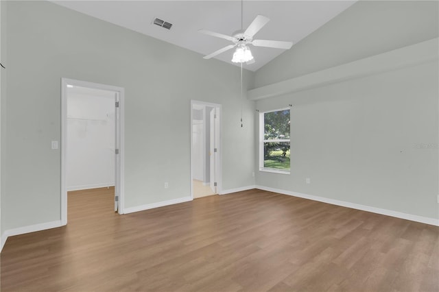 3507 Tenby Cir, Clermont, FL 34711 - unfurnished room featuring wood finished floors, high vaulted ceiling, and a ceiling fan